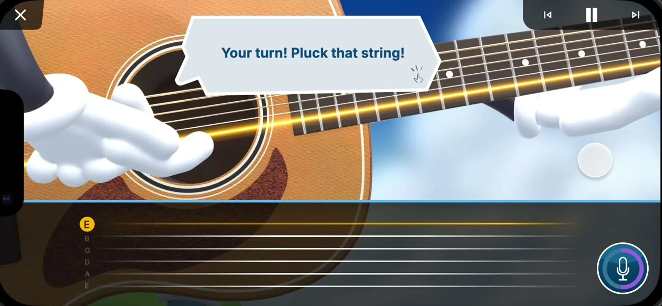 Close-up guitar: Your turn! Pluck that string!